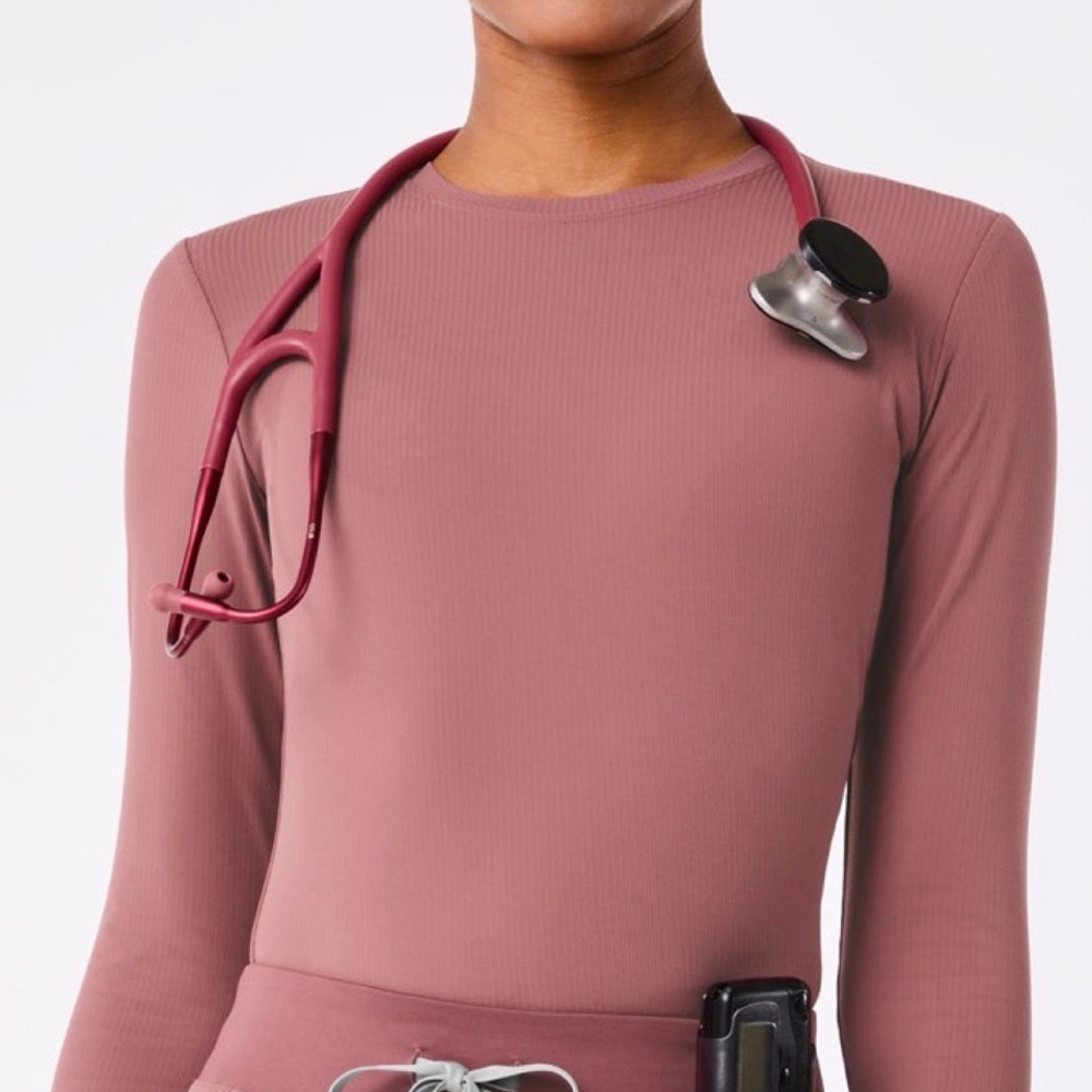 FIGS - Long Sleeve Ribbed Crewneck Top in Mauve Pink and Moss Green.